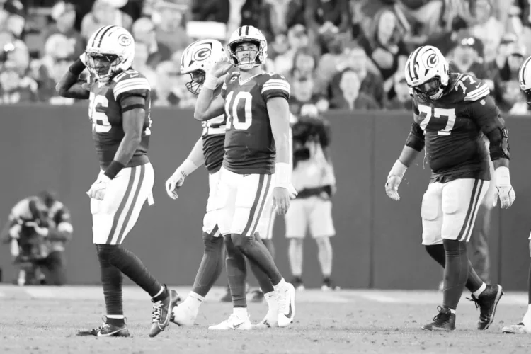 Packers struggle in home opener